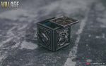 The crests of the four lords of the Village. The cube is designed to hold the crests with magnets. The crests can also be attached to any metallic surface.